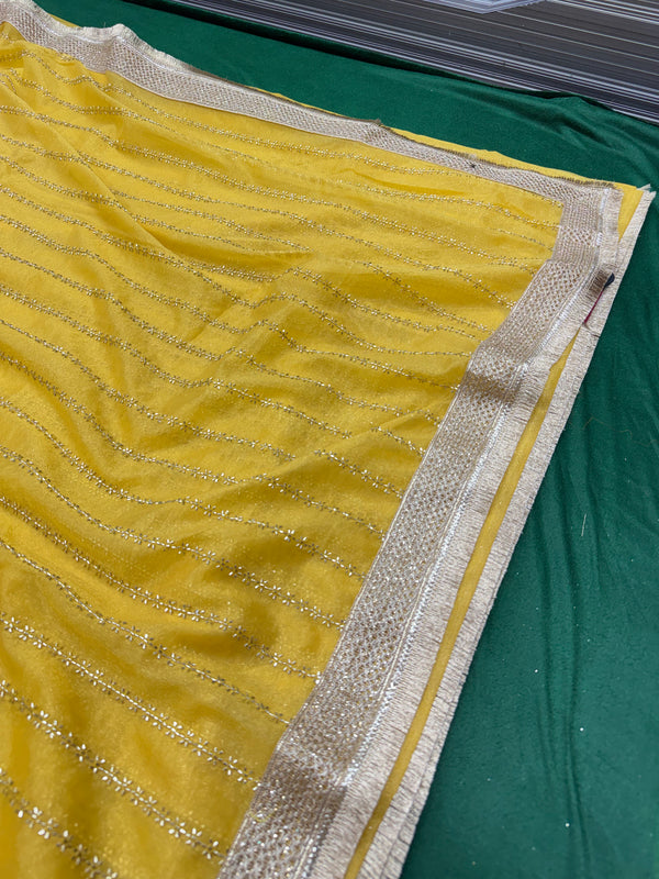 Designer Tissue Saree With Allover Work In Yellow Colour With Trending Border