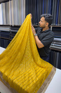 Designer Tissue Saree With Allover Work In Yellow Colour With Trending Border