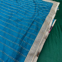 Designer Tissue Saree With Allover Work In Teal Blue Colour With Trending Border