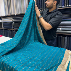 Designer Tissue Saree With Allover Work In Teal Blue Colour With Trending Border